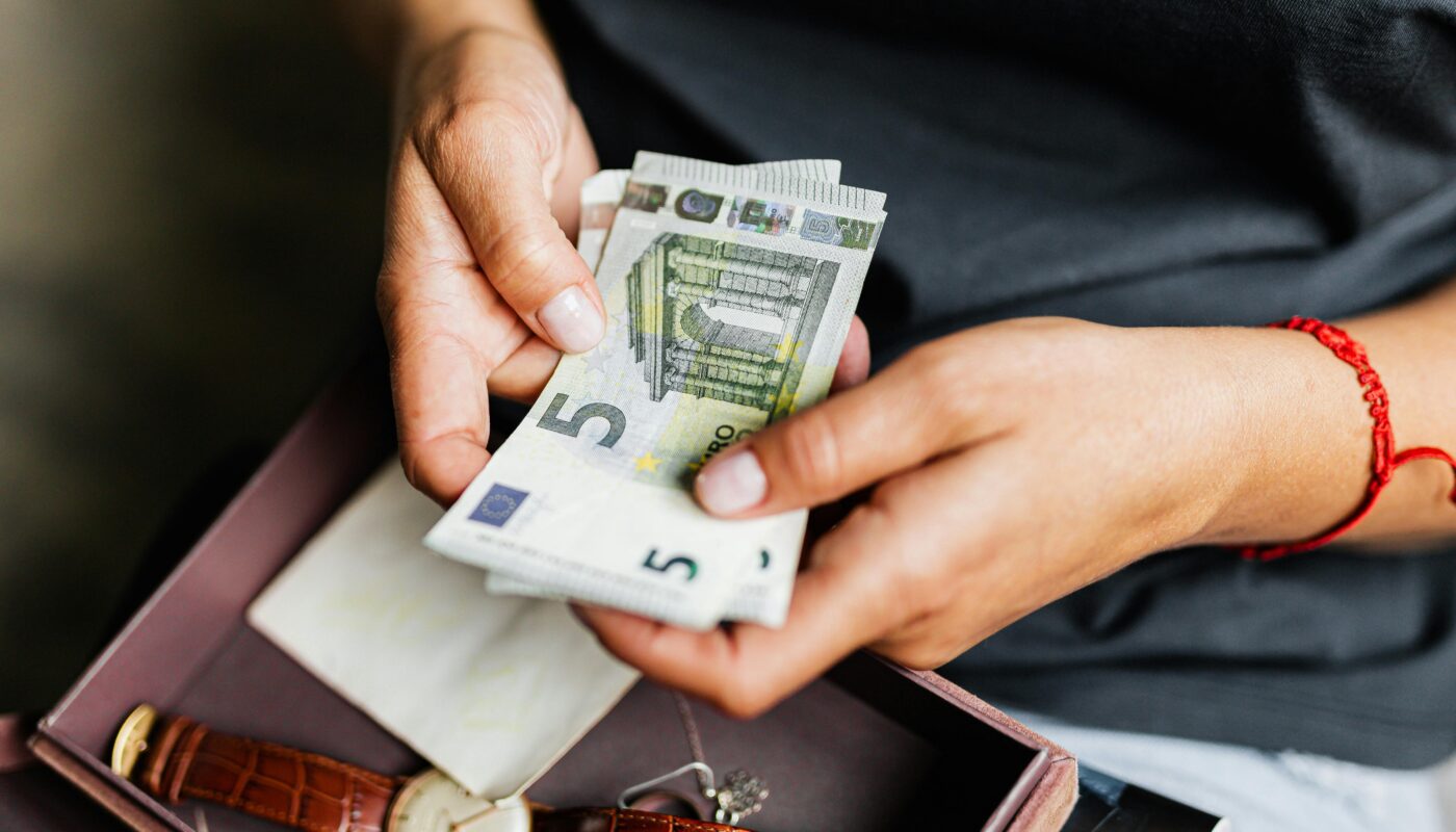 https://www.pexels.com/photo/hands-of-a-person-holding-cash-bills-4960141/