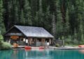 https://www.pexels.com/photo/wooden-hut-on-a-lakeshore-in-mountains-and-kayaks-moored-in-front-of-it-7162610/
