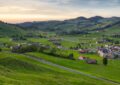 https://www.pexels.com/photo/scenic-aerial-view-of-swiss-countryside-at-dusk-28677182/
