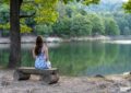 https://www.pexels.com/photo/brunette-woman-in-blue-dress-sitting-on-bench-and-looking-at-lake-19283220/