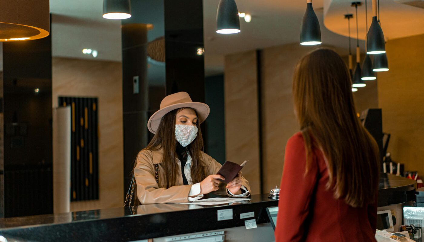 https://www.pexels.com/photo/a-woman-standing-at-the-counter-7820325/